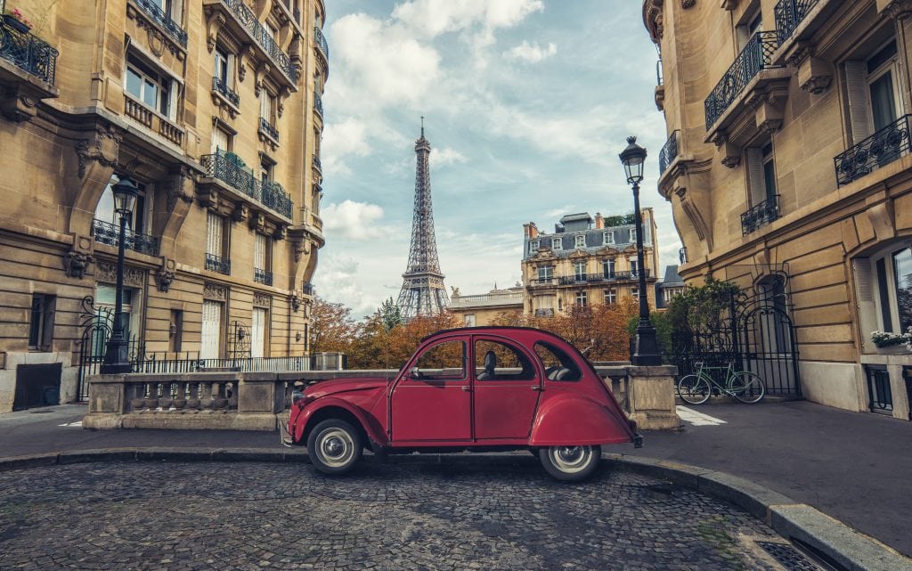 Avenue de Camoens in Paris with red retro car